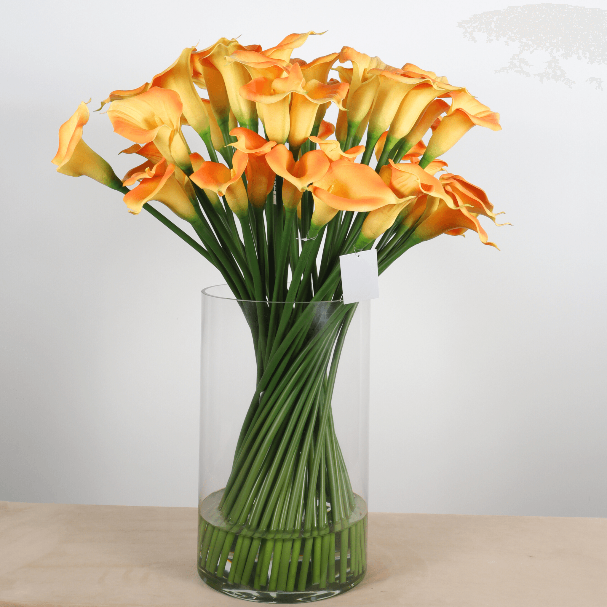 76 cm Artificial Orange Calla Bouquet with 56 Stems in Glass Vasemanufacturer